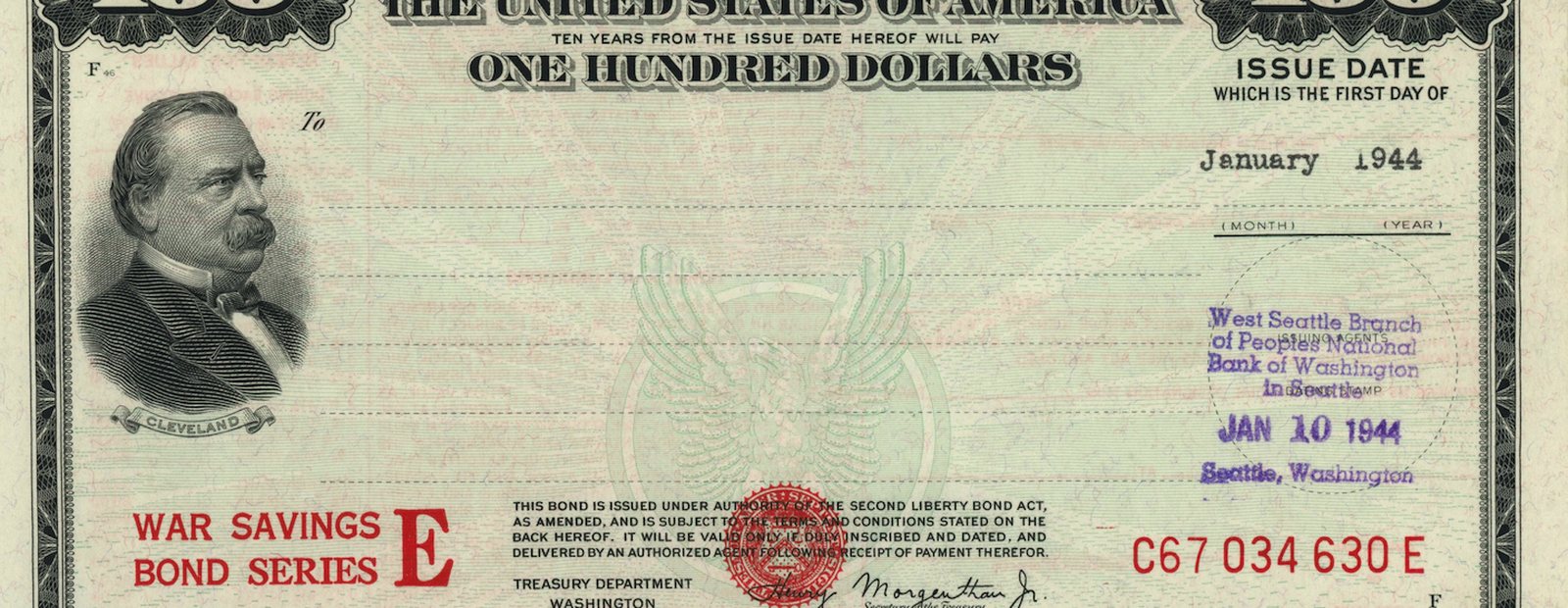 A 1944 one hundred dollar Series E war savings bond, green, with the issue date January 1944.